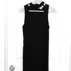 Classic little black dress with a choker collar.